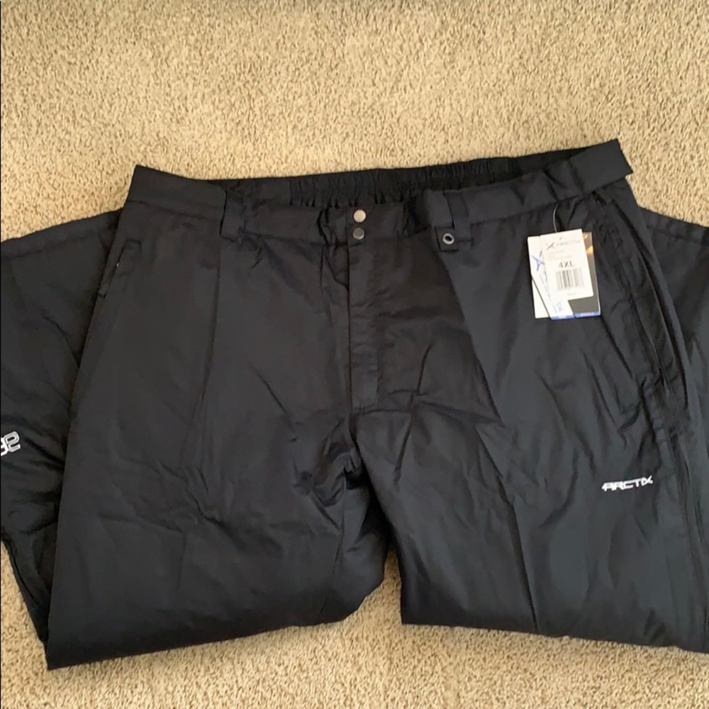 Arctix Full side zip winter pants.
